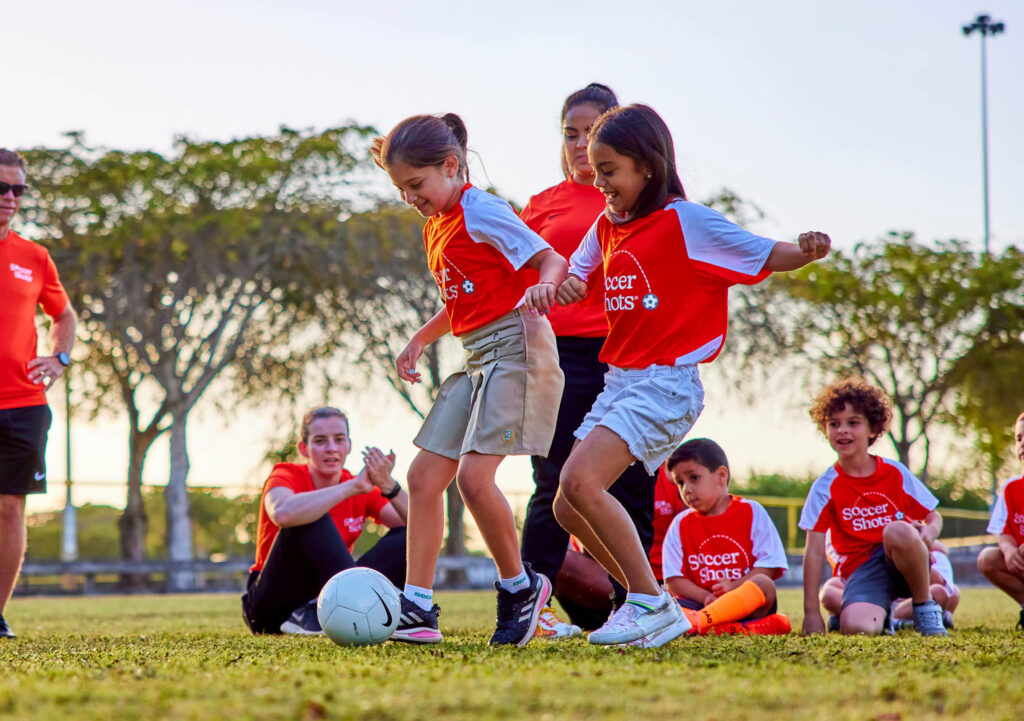 Soccer shots kids playing soccer